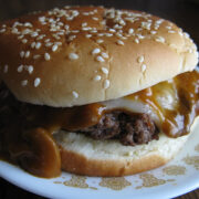 Mushroom burger with melted cheese on a sesame bun