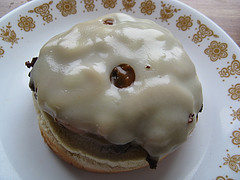 Open faced mushroom burger topped with melted cheese