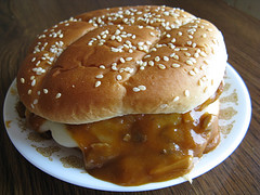 Mushroom burger with melted cheese on a sesame bun