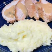 Garlic mashed potatoes, prepared on plate.