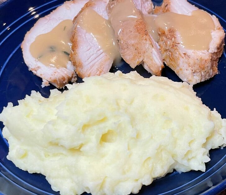 Garlic mashed potatoes, prepared on plate.