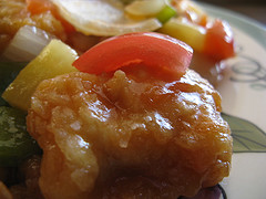 Sweet and sour chicken with bell peppers and pineapple