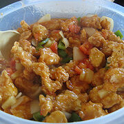Sweet and sour chicken with bell peppers and pineapple