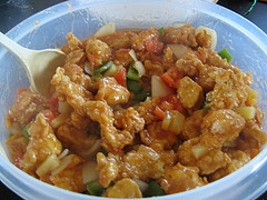 Sweet and sour chicken with bell peppers and pineapple