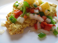 Cajun tilapia topped with pineapple and diced vegetables