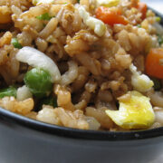 Chinese fried rice with egg and vegetables in a bowl