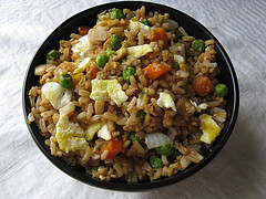 Chinese fried rice with egg and vegetables in a bowl