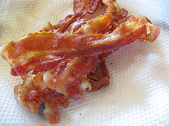 Crispy bacon strips on a paper towel