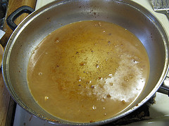Pan with liquid base for chicken carbonara sauce