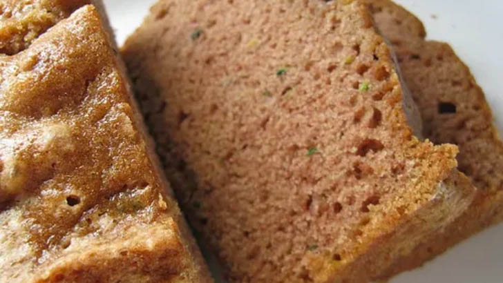 Close up view of prepared, sliced zucchini bread.