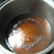 Sauce mixture in a metal bowl.
