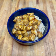 Prepared bourbon chicken recipe in bowl.