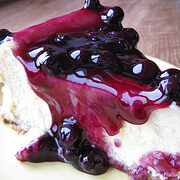 slice of blueberry-topped cheesecake