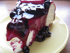 slice of blueberry-topped cheesecake