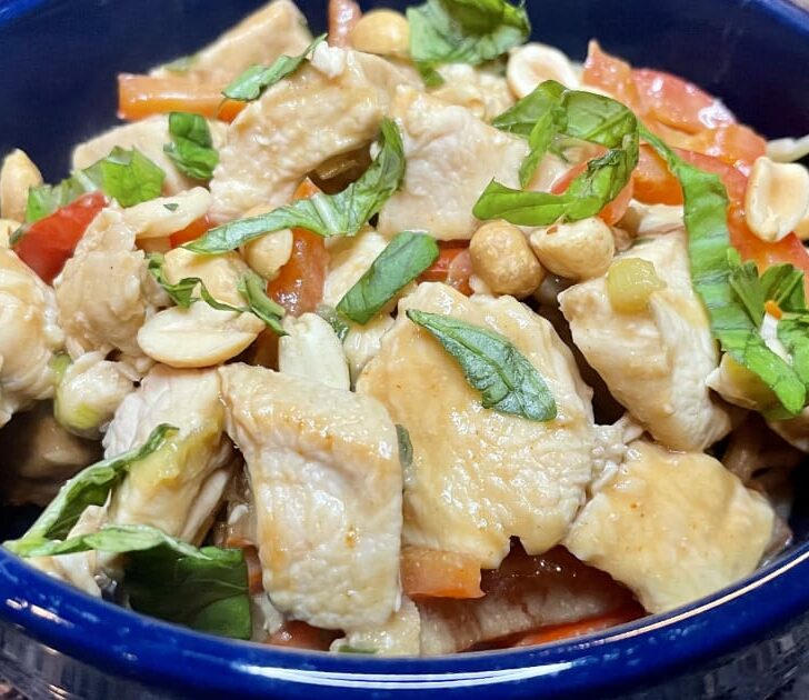 Thai peanut chicken recipe prepared in bowl.