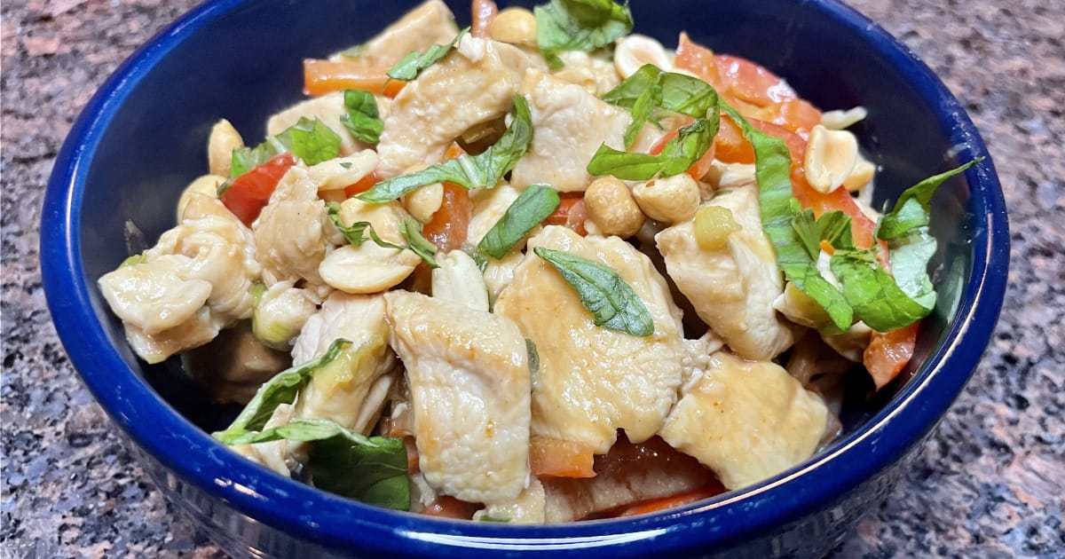 Thai peanut chicken recipe prepared in bowl.