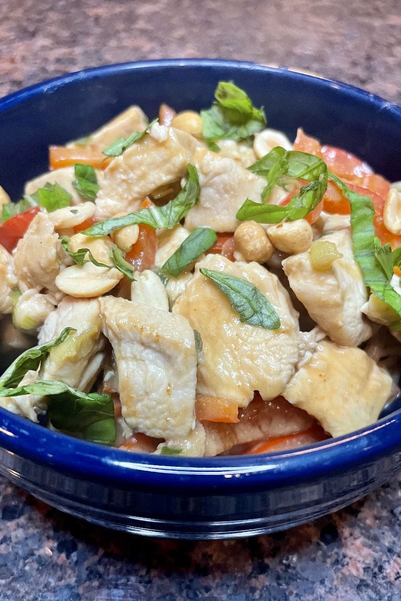 Thai peanut chicken recipe prepared in bowl.