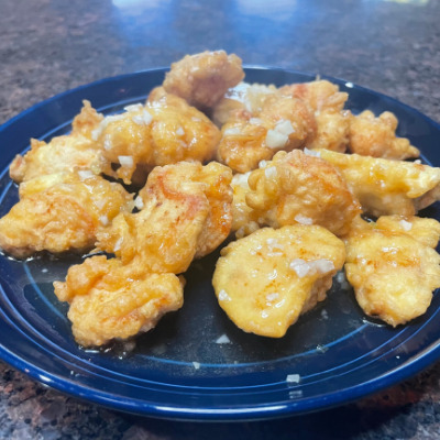 Close up view of Chinese honey chicken prepared.