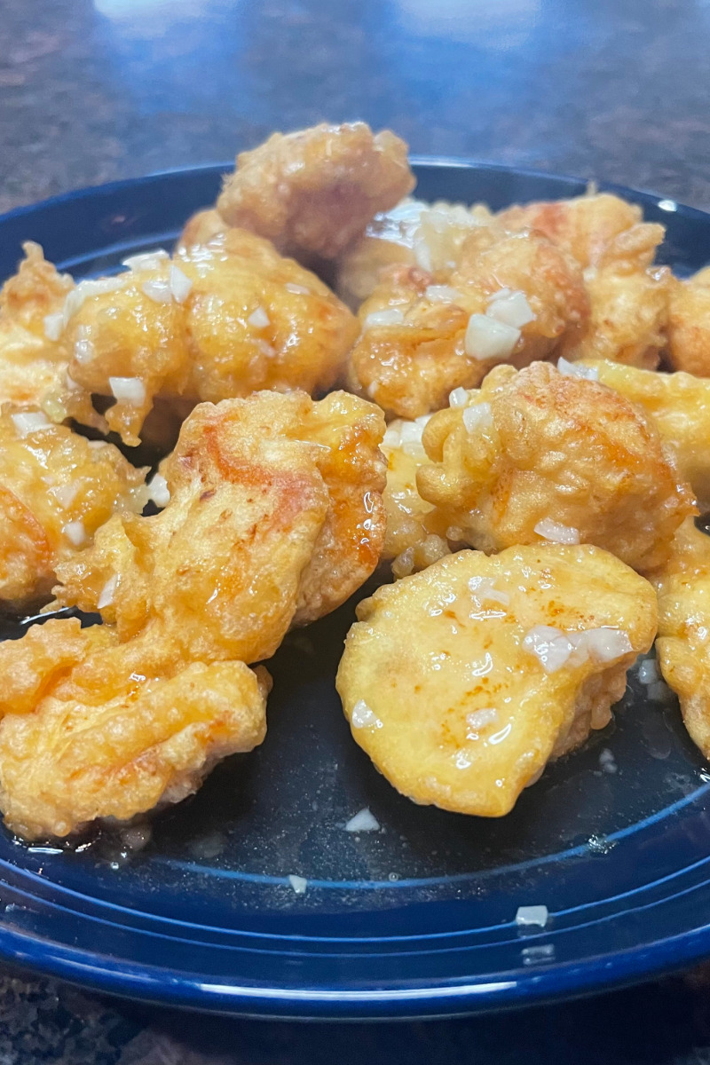 Close-up view of prepared Chinese honey chicken.