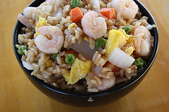 owl of shrimp fried rice with peas, carrots, onions, and scrambled eggs
