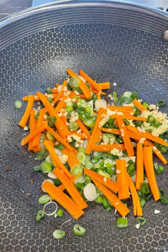 Vegetables in wok for ginger beef.