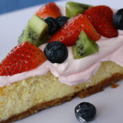 slice of cheesecake with fresh fruit topping