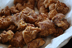 Fried chicken pieces before adding sauce.