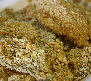 Fish fillets coated in seasoned breading