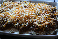 Close view of cheesy burrito casserole fresh from the oven