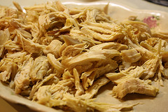 Shredded chicken on a plate prepared for white chicken chili