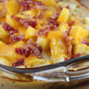 Ranch potatoes baked with cheese and bacon in a glass dish
