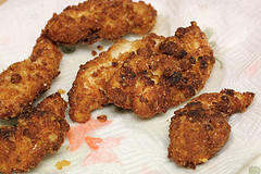 Golden fried ranch chicken strips on paper towels