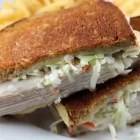 Close up view of turkey Reuben sandwich.