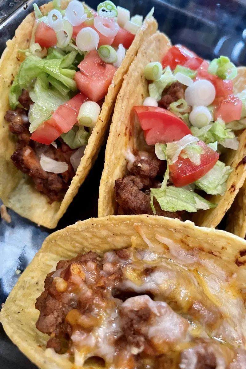 Baked tacos in a baking dish. 