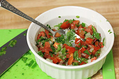 Bowl of fresh pico de gallo with diced tomatoes, onions, and cilantro
