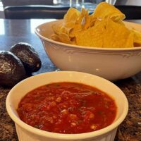 Close-up view of Chili's salsa recipe, prepared and served in white dish.