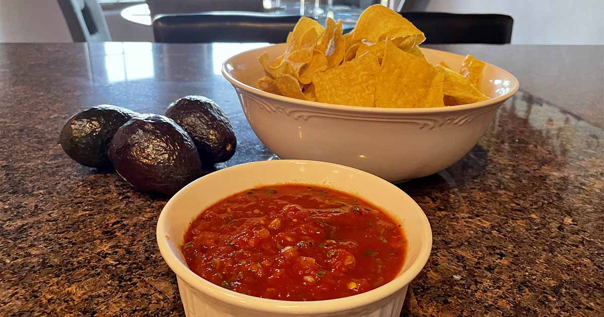 Close-up view of Chili's salsa recipe, prepared and served in white dish.