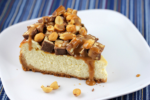 snickers cheesecake slice