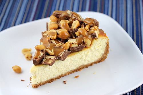 snickers cheesecake slice