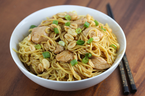 Charlie chan chicken pasta served in a white bowl