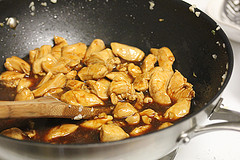 Cooked chicken pieces in a wok for charlie chan chicken pasta