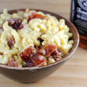 Jack Daniel’s mac and cheese in a bowl topped with bacon
