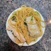 Prepared ginger noodles with chicken.