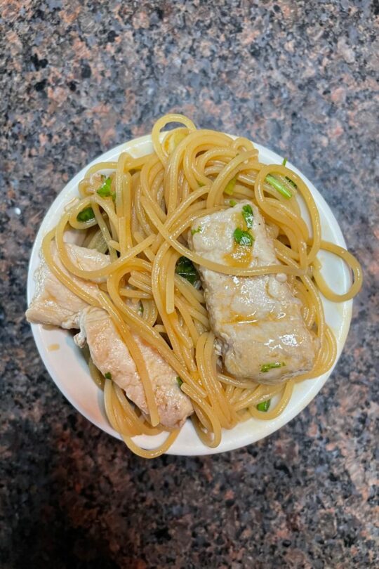 Prepared ginger noodles with chicken.