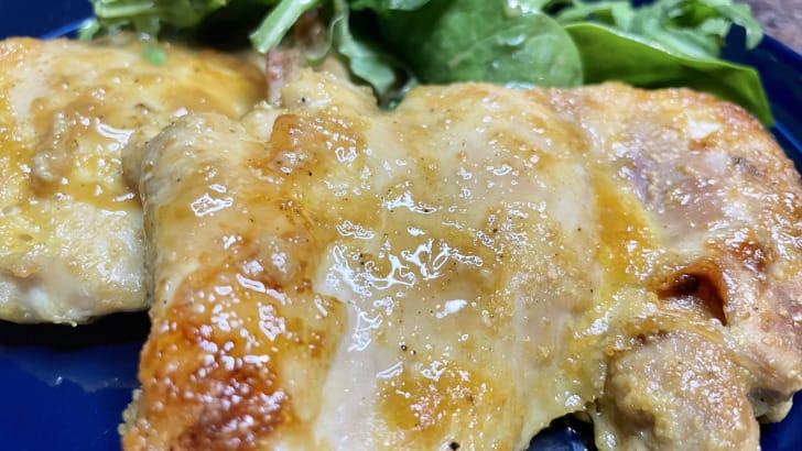 Baked chicken thighs recipe, prepared for serving.