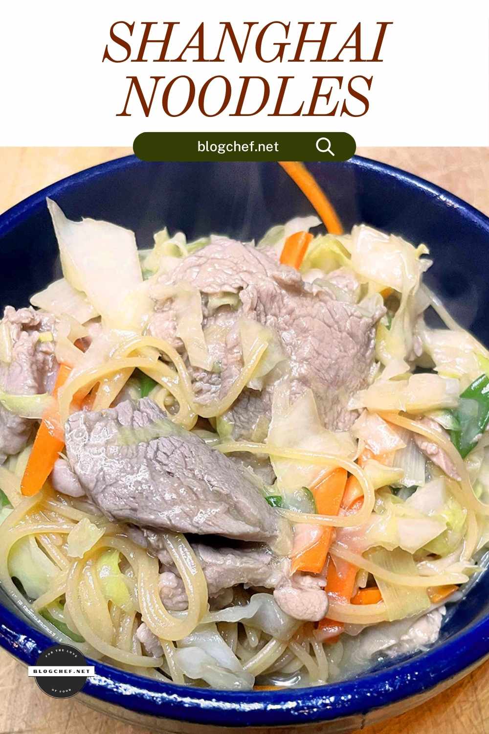 Prepared Shanghai noodles in blue bowl. 