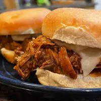 Close up of slow cooker Italian beef sliders.