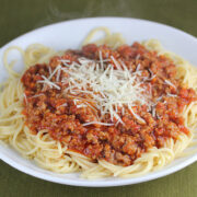 Olive Garden bolognese served over spaghetti with cheese