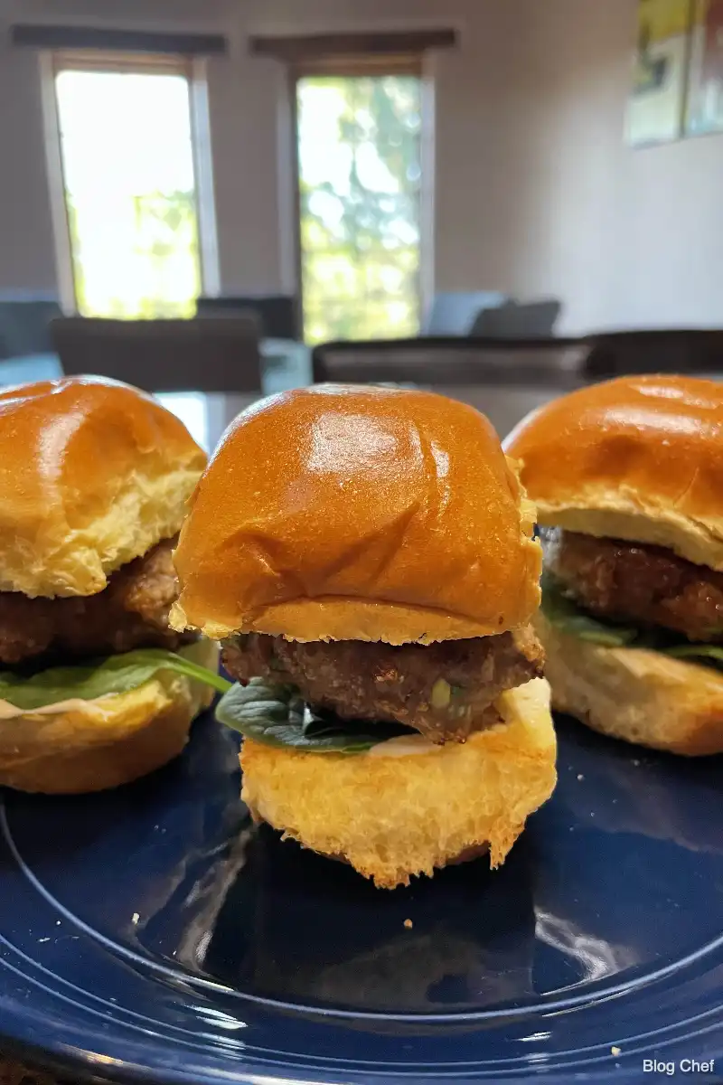 Chinese sliders prepared on blue plate.