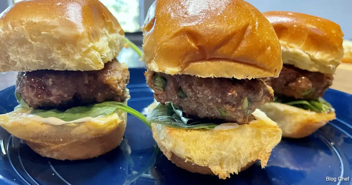 Chinese sliders prepared on blue plate.